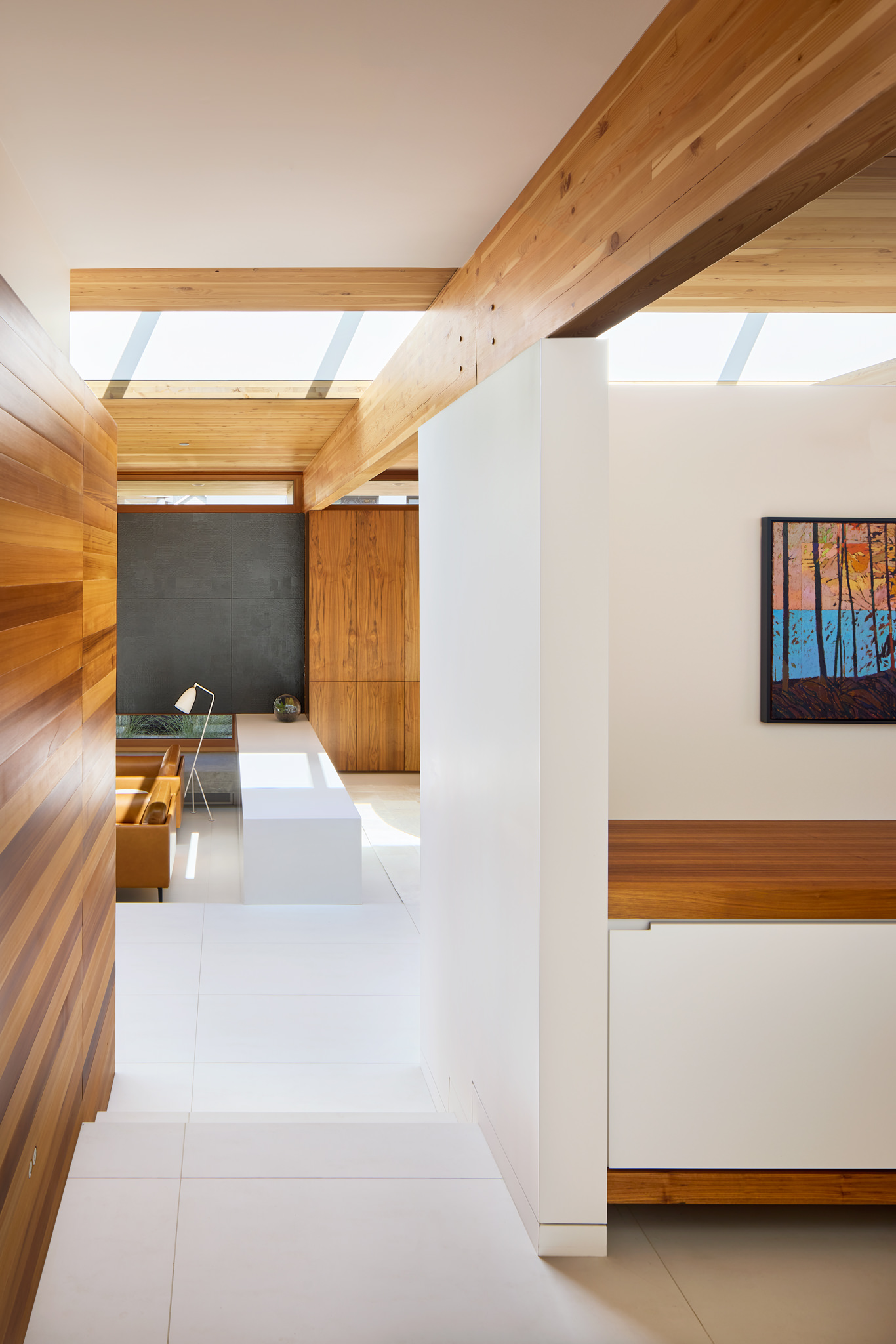 Interior view of modern home with wood walls and beams