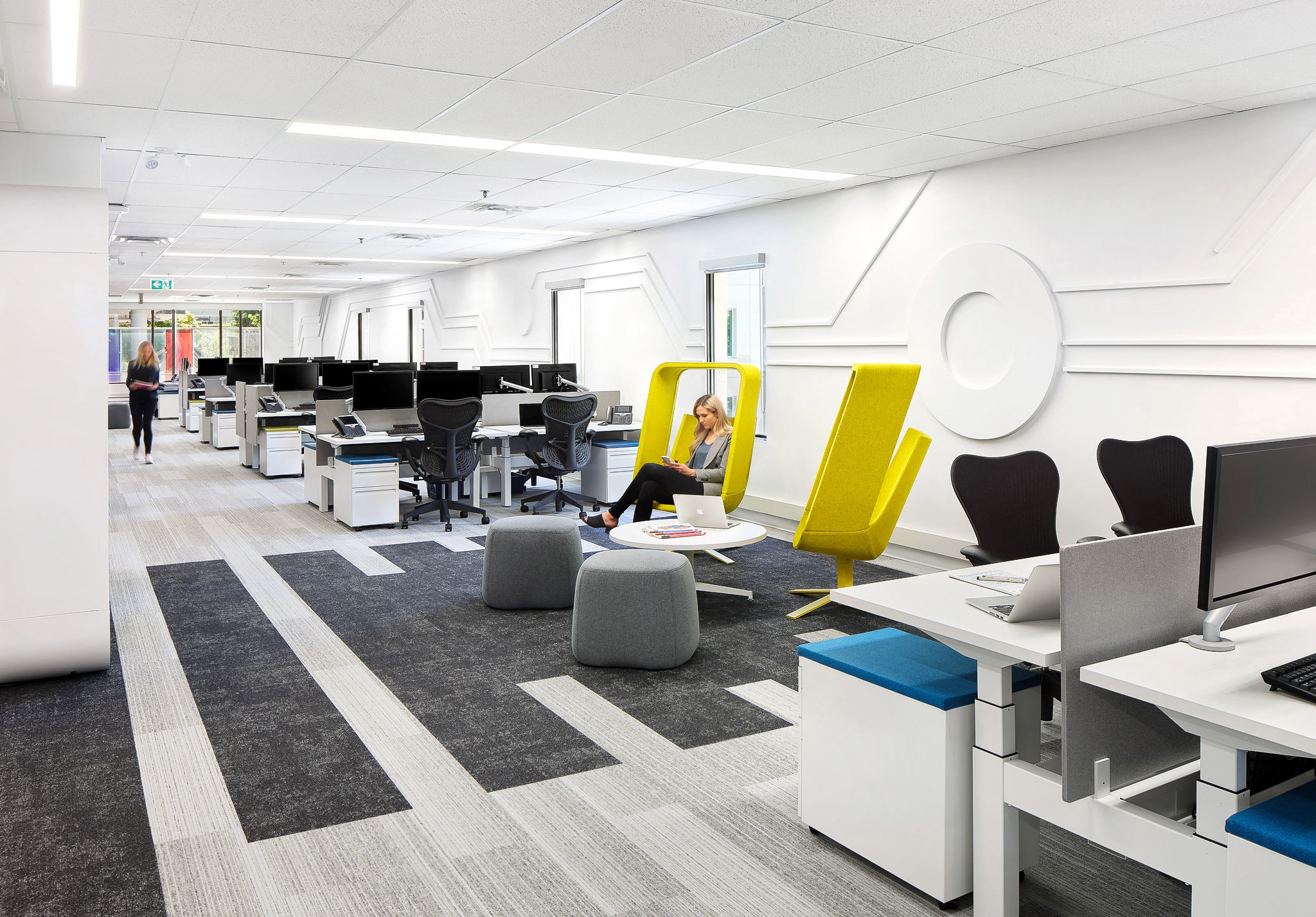 Two Yellow Chairs In Open Workspace of Modern Monochromatic Office